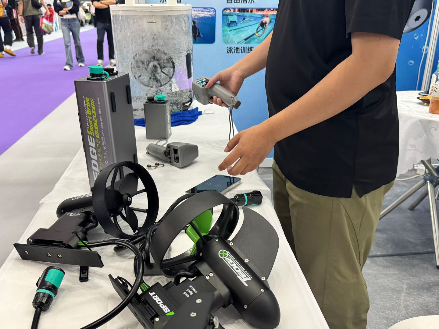 Close-up of a Tedgix propulsion product during a hands-on demonstration at COSP Shenzhen 2026.