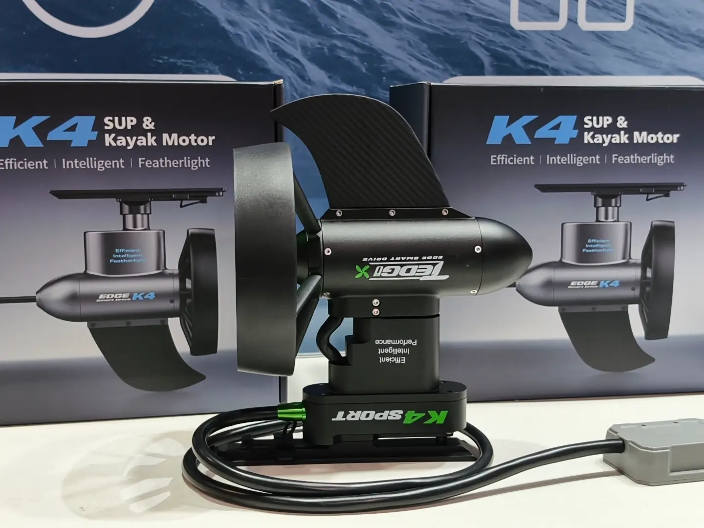 The Tedgix K4 portable kayak and SUP motor, showcasing its sleek, lightweight, and modern hydrodynamic design.