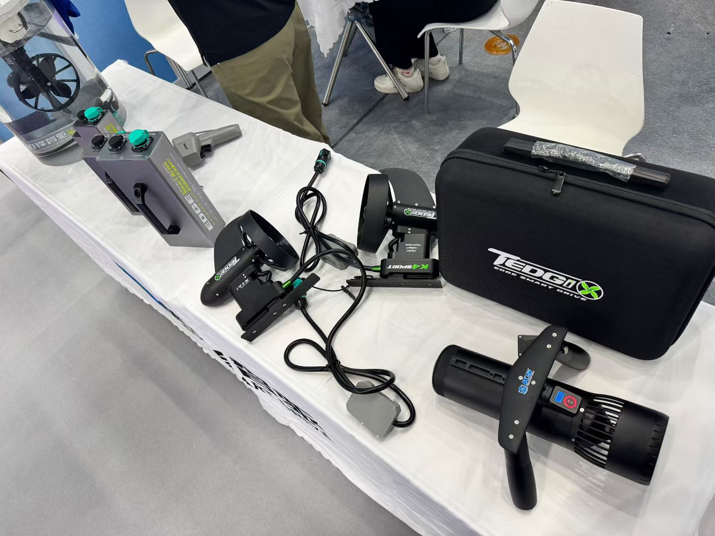 Tedgix underwater mobility product and accessories displayed on the exhibition table at COSP Shenzhen 2026.
