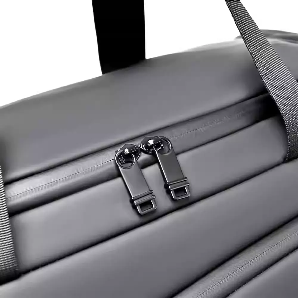 Close-up detail of the durable double metal zippers on the TEDGIX K4 carrying case, ensuring secure closure.