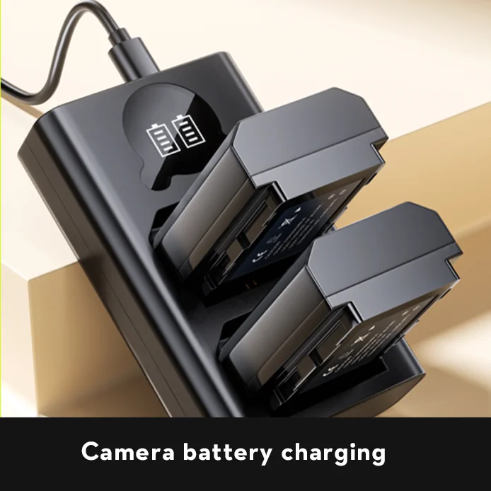 Photographer utilizing TEDGIX marine battery to recharge camera batteries while on location.