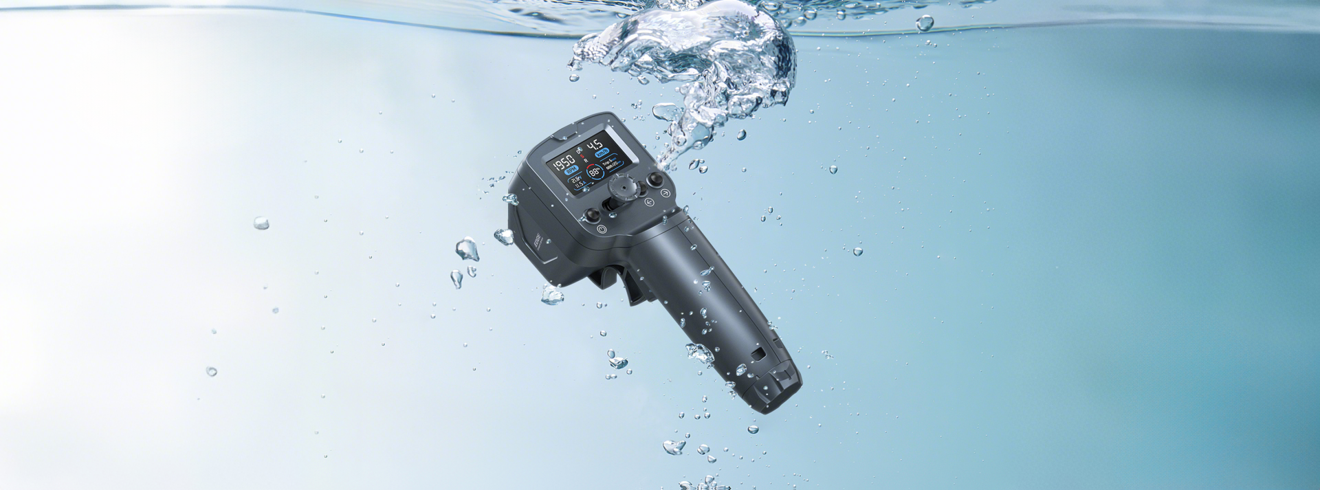 TEDGIX K4 wireless remote submerged in water, demonstrating IP68 waterproof rating and clear OLED data display.